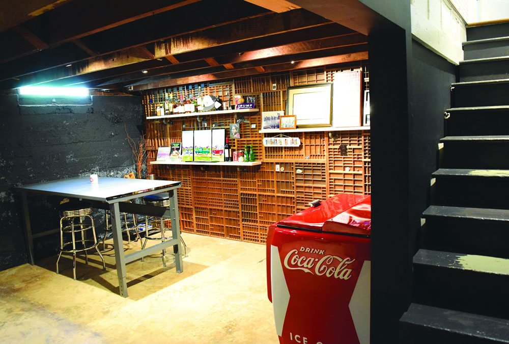 basement with a coca cola machine