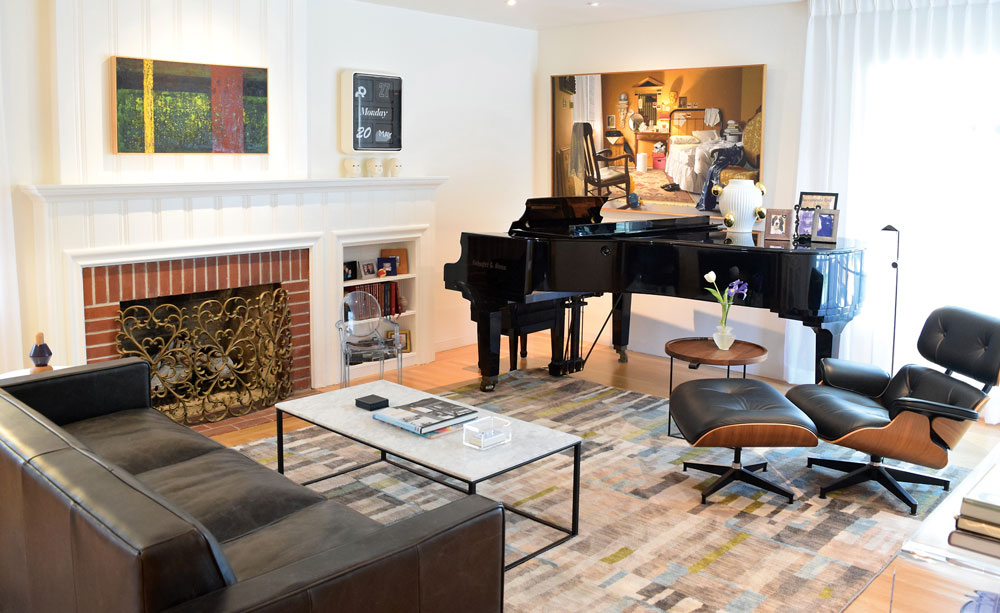 living room with baby grand piano