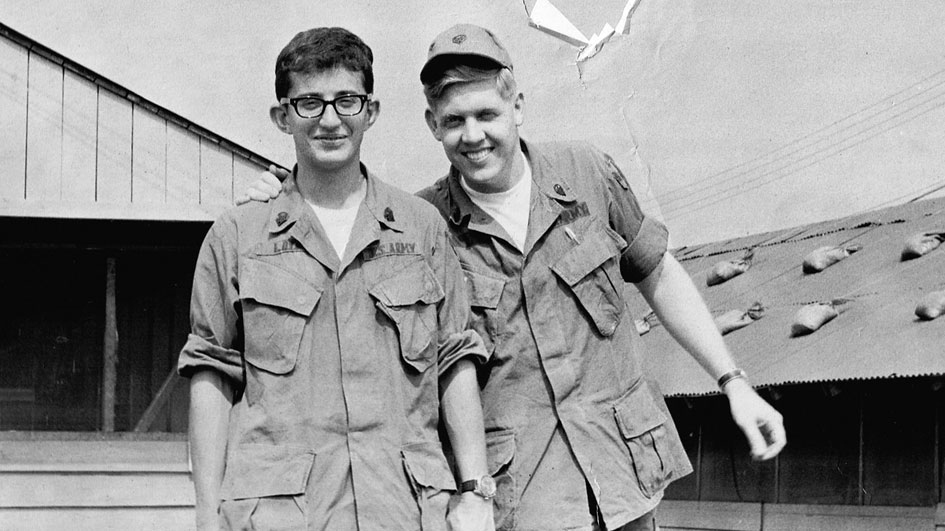 Black and white photo of veteran Elliott Loyd with fellow soldier